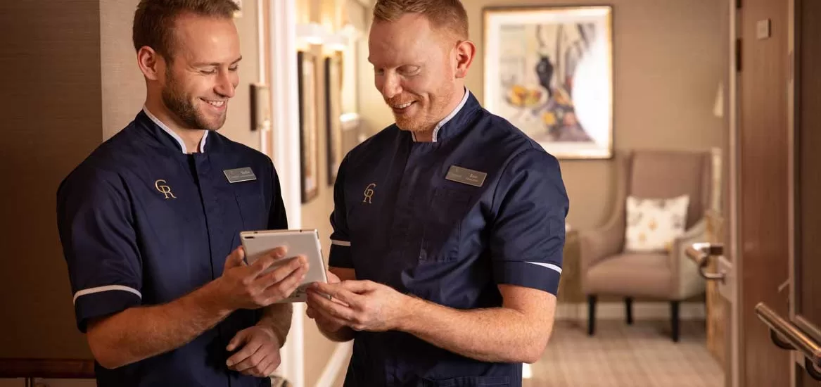 Care home staff working on app